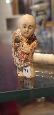 Boy with bag - netsuke